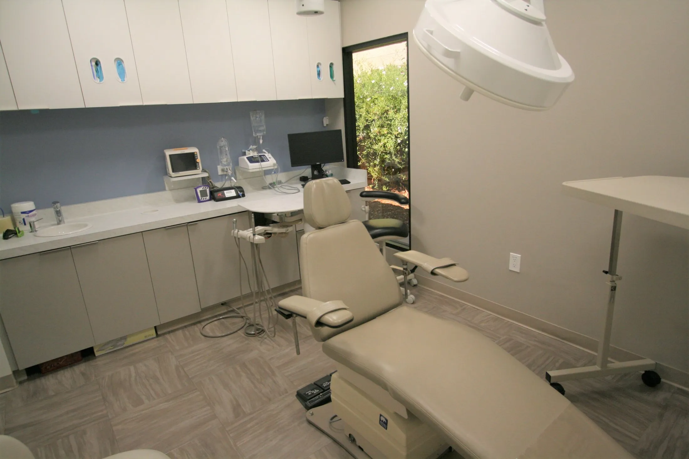Spacious dental treatment room with a dental chair, Pittsburg Dental Specialists