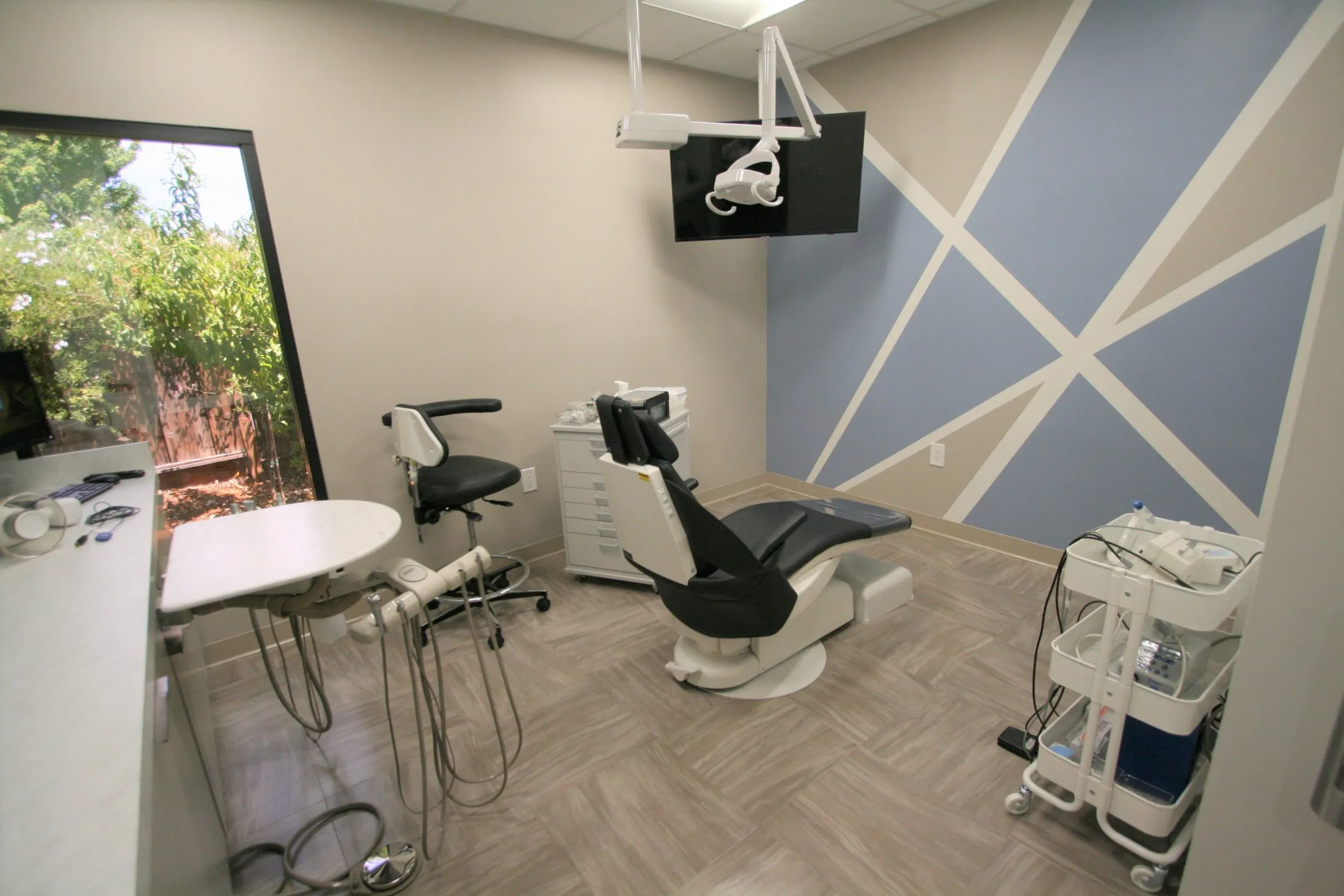 Spacious dental treatment room with a dental chair, Pittsburg Dental Specialists