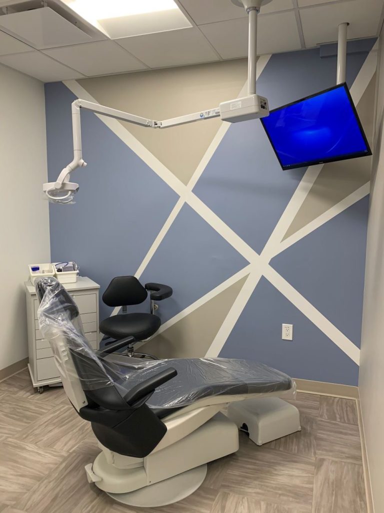 Modern dental treatment room with a dental chair, Pittsburg Dental Specialists